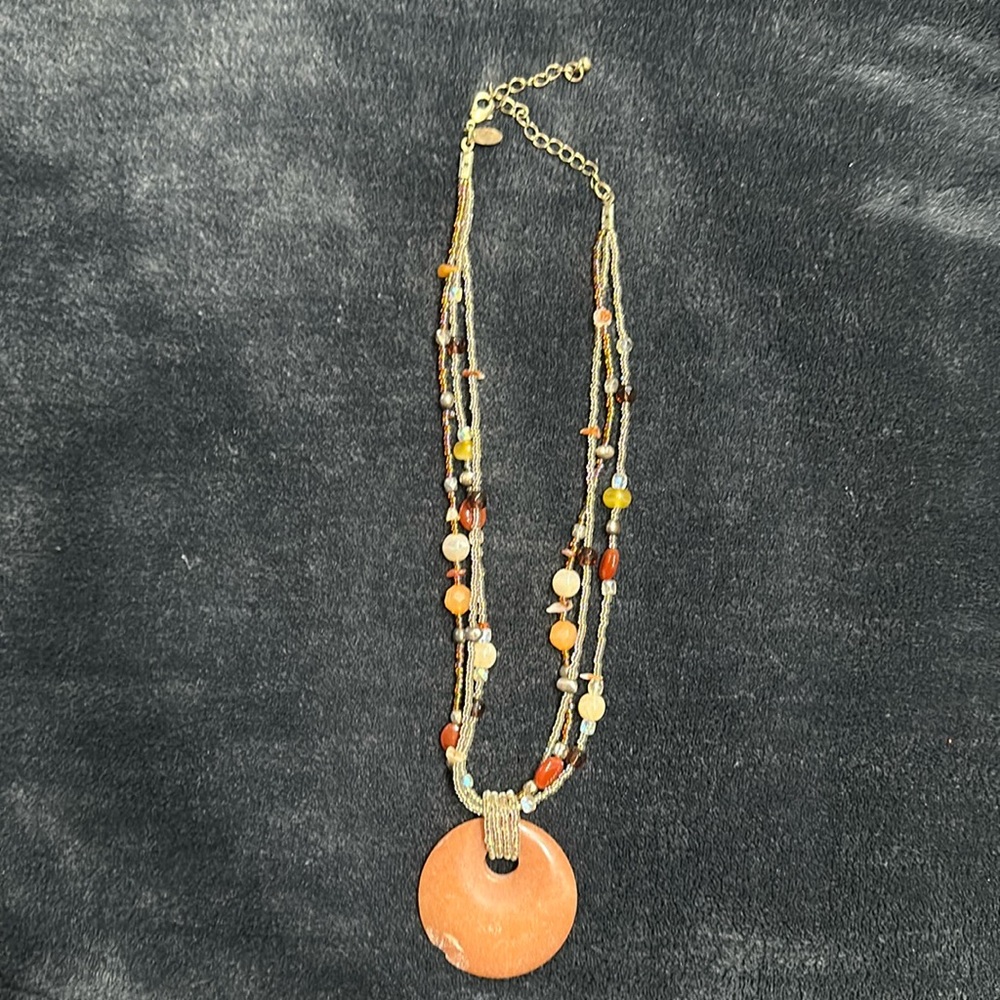 Lia Sophia necklace with a chip on large stone.